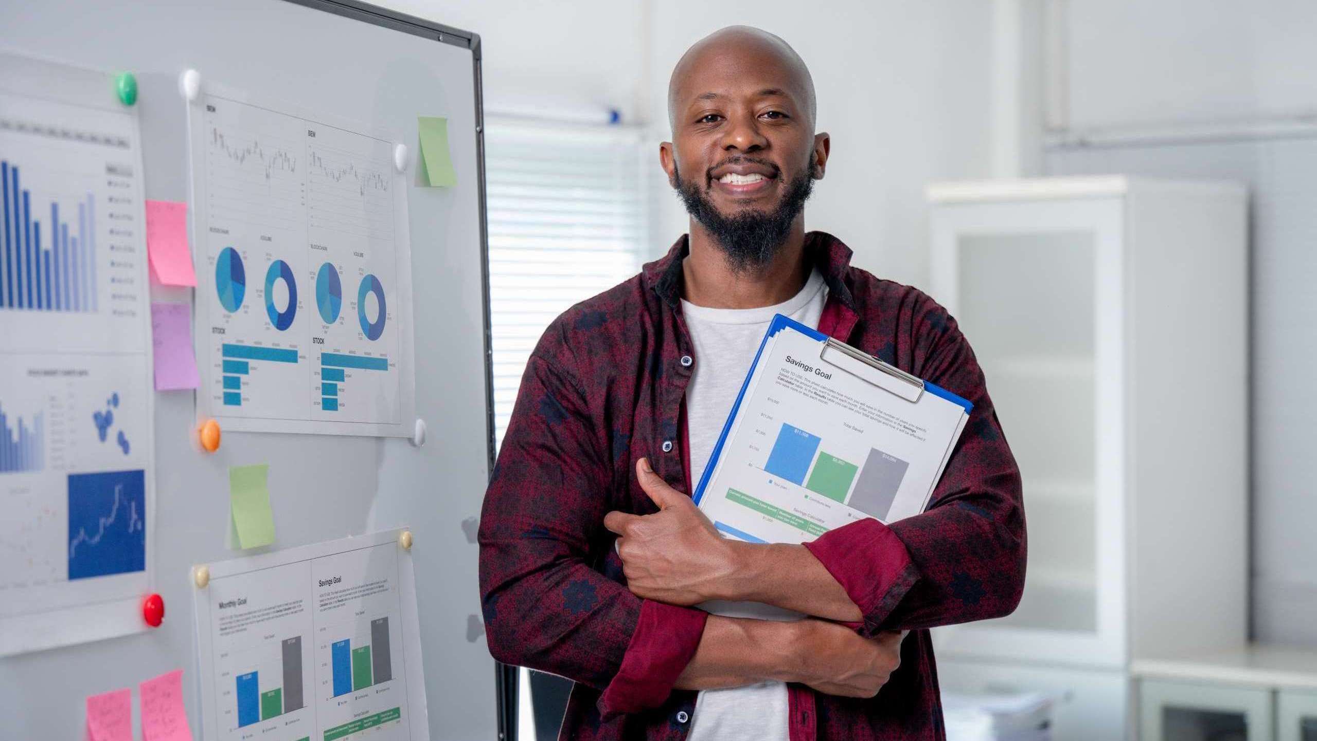 Church leader reviewing communication metrics and reports to evaluate effectiveness.